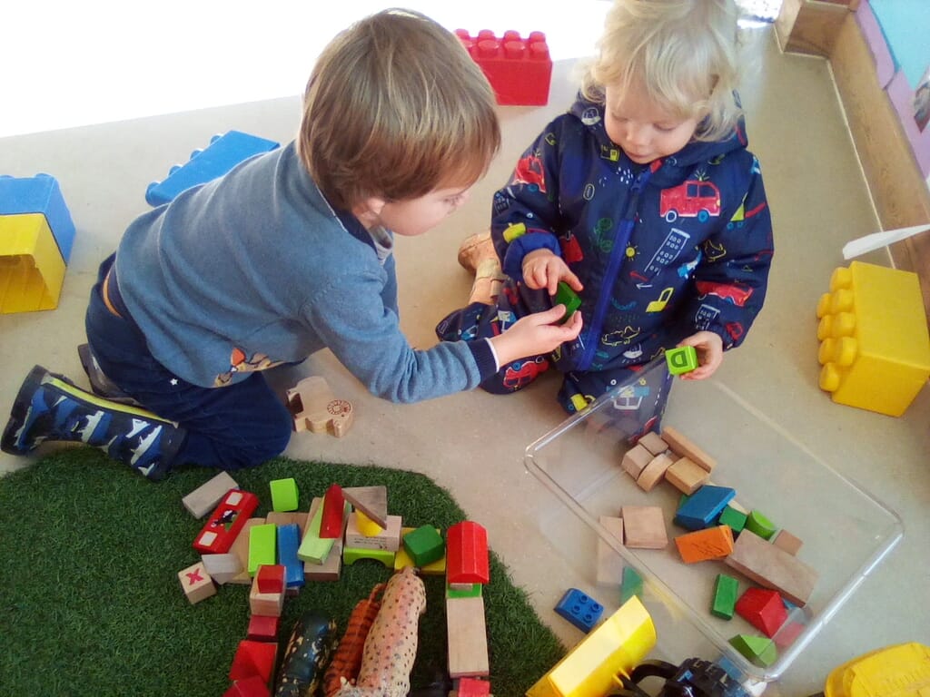 Children playing at The Old Station Nursery in Innsworth