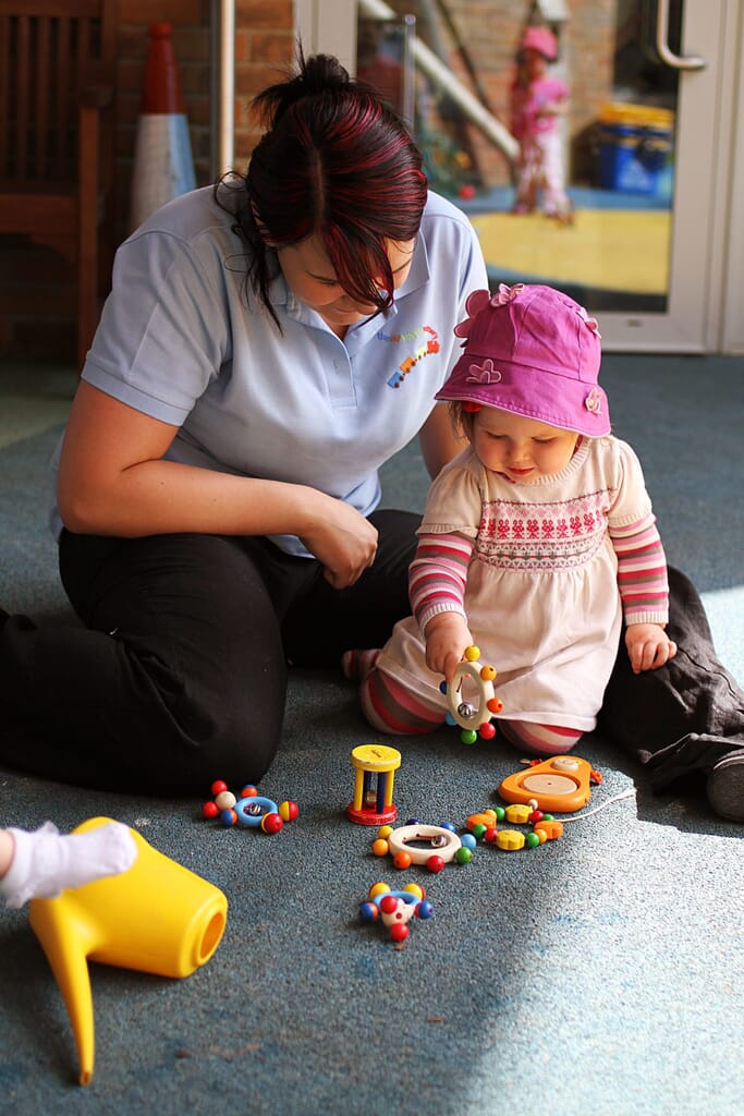 Uxbridge day care nursery staff with a child