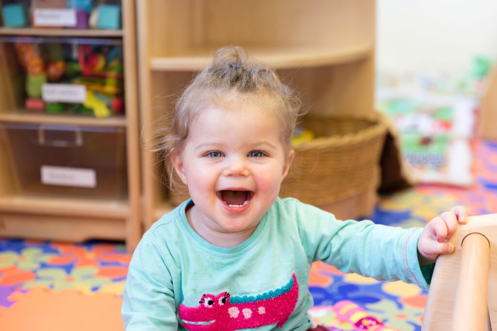 Little girl smiling in Wellingborough Day Nursery