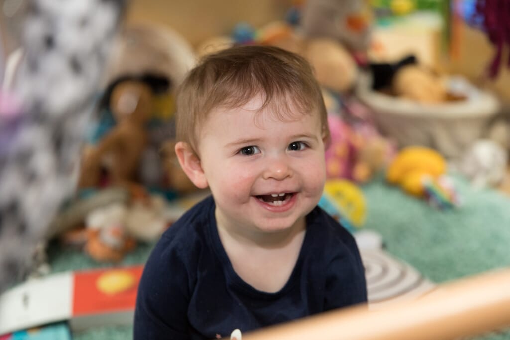 Boy smiling in Harpole Day Nursery