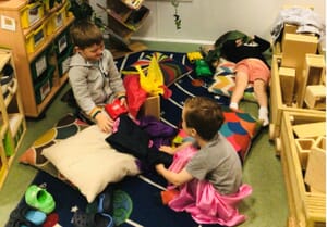 Nursery children playing indoors