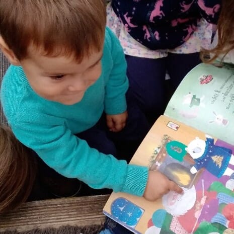 Nursery child reading book