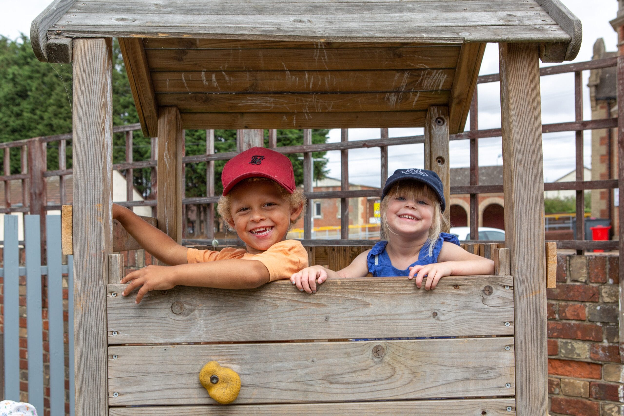 Children Playing Together on Outdoor Apparatus