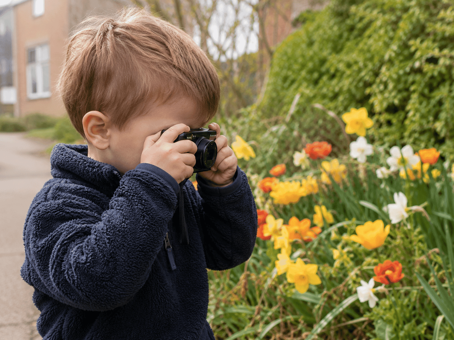 Child exploring taking photos