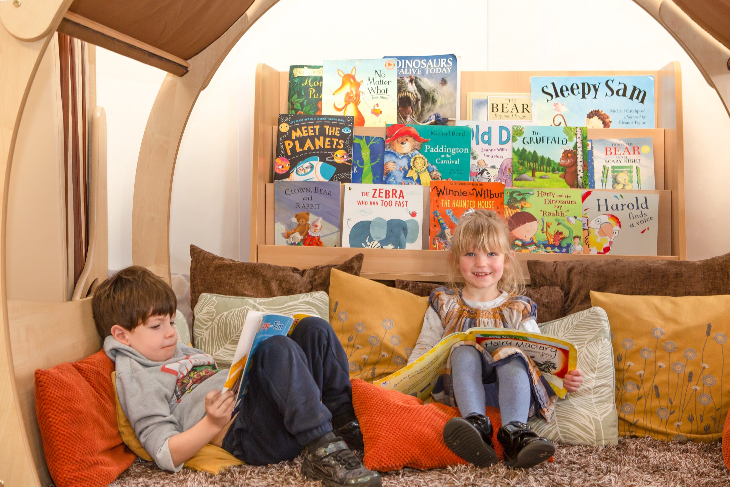 Children in reading area at nursery