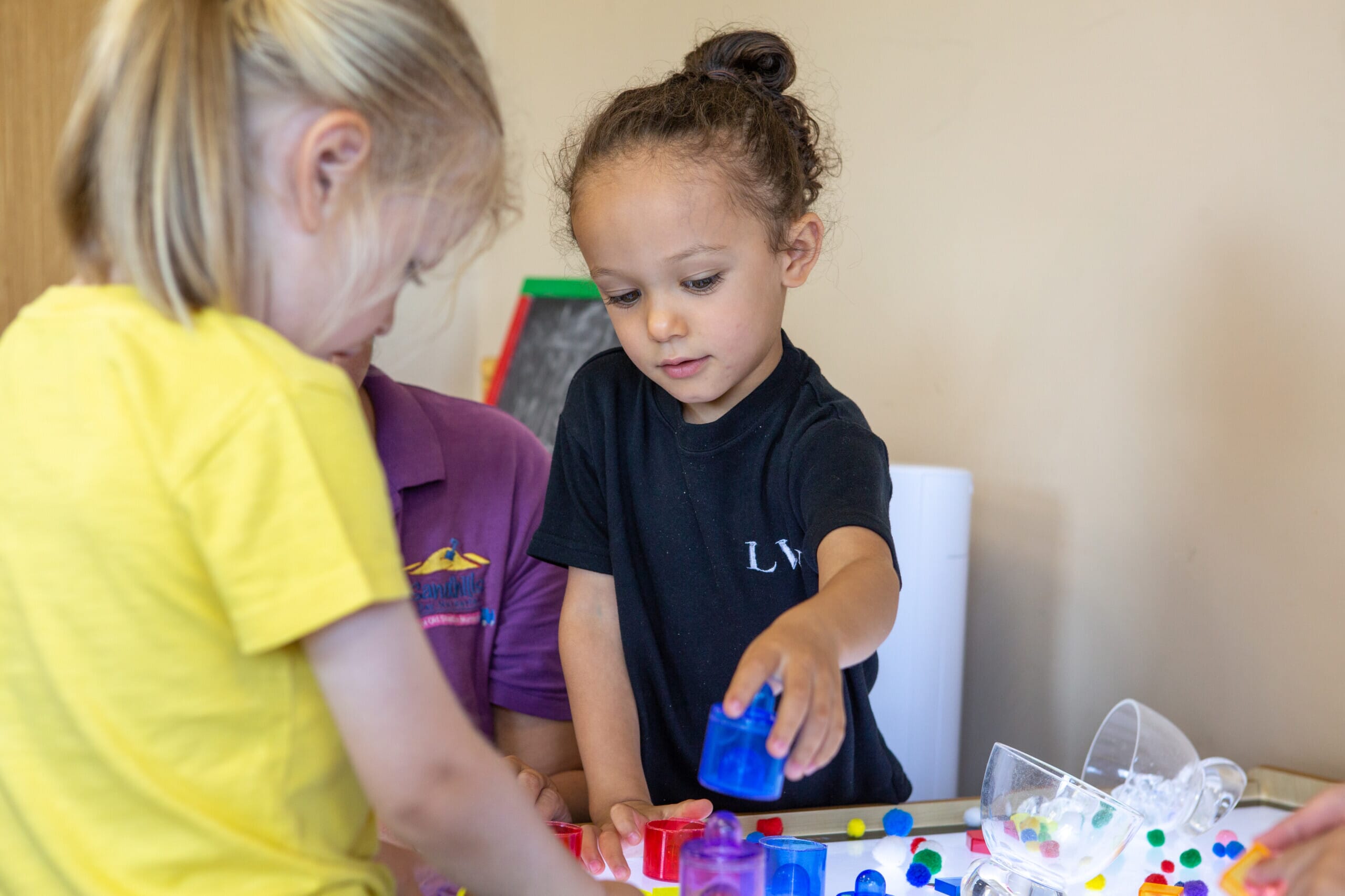 Young boy engaged in sorting activity