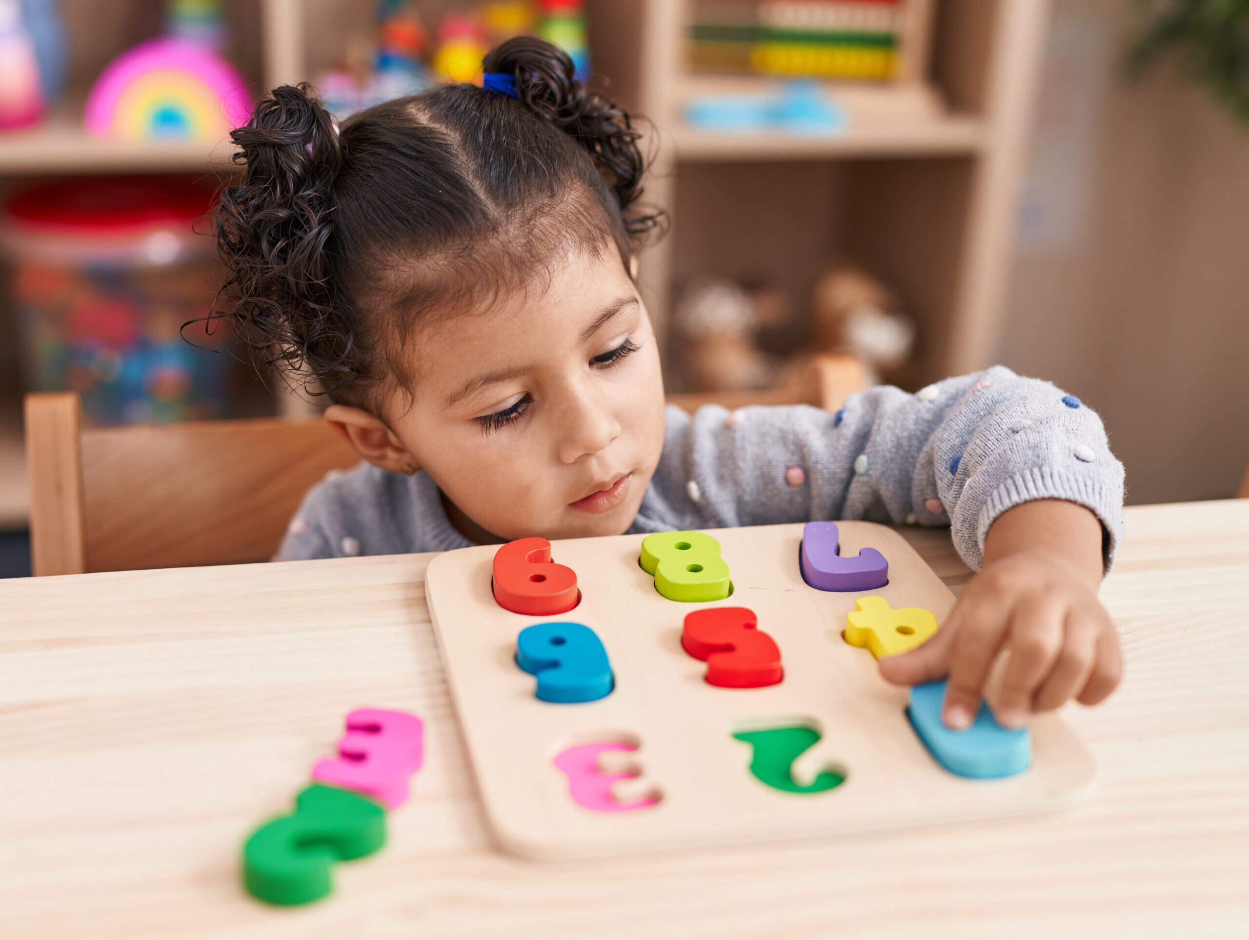 Young girl taking part in learning activity