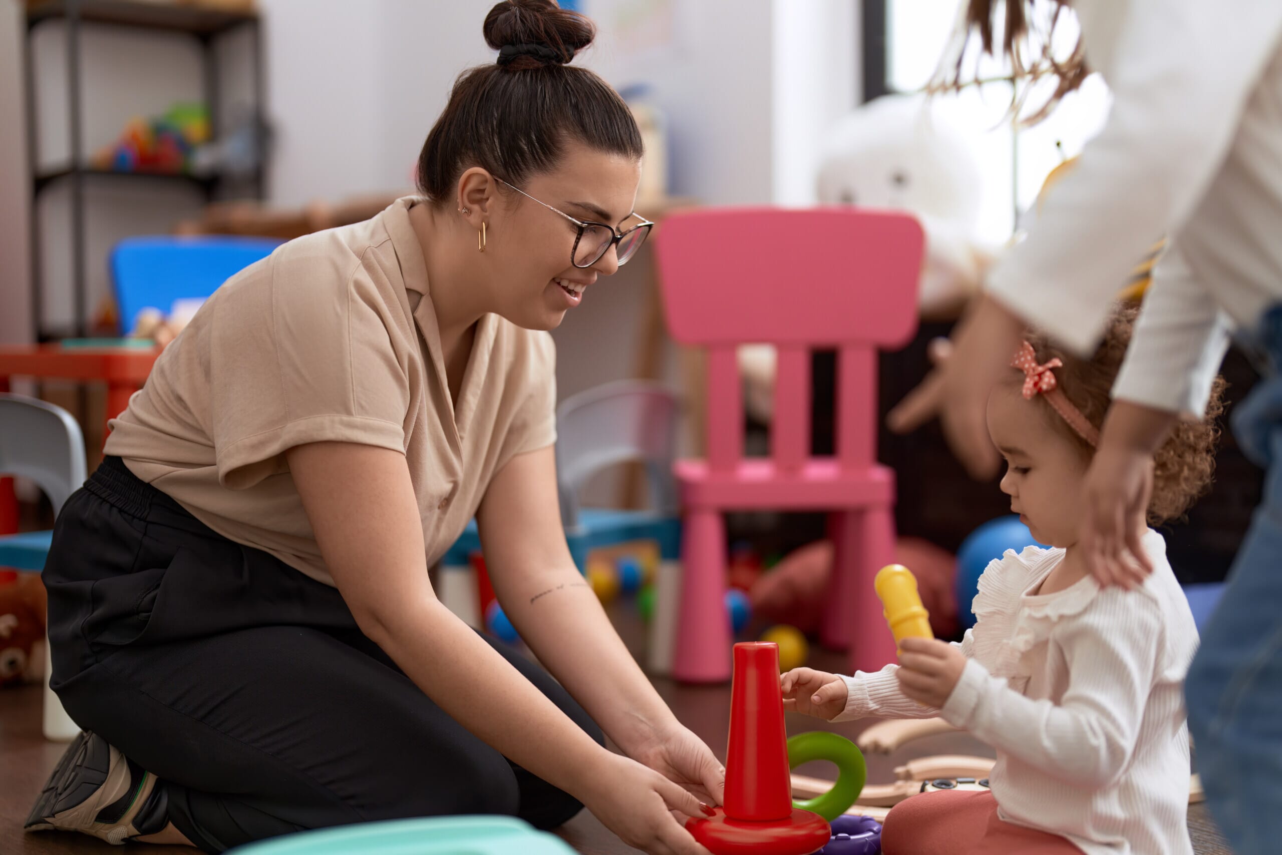 Toddler with nurswery practitioner